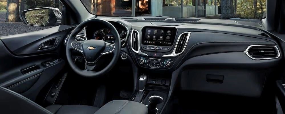 2020 chevy equinox interior of front seats and tech