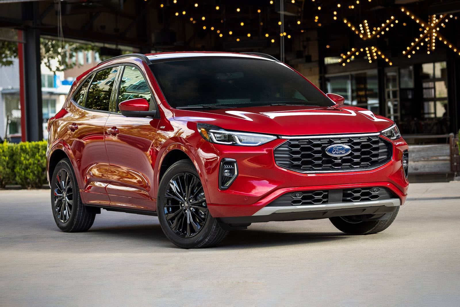 A red escape sitting parked.