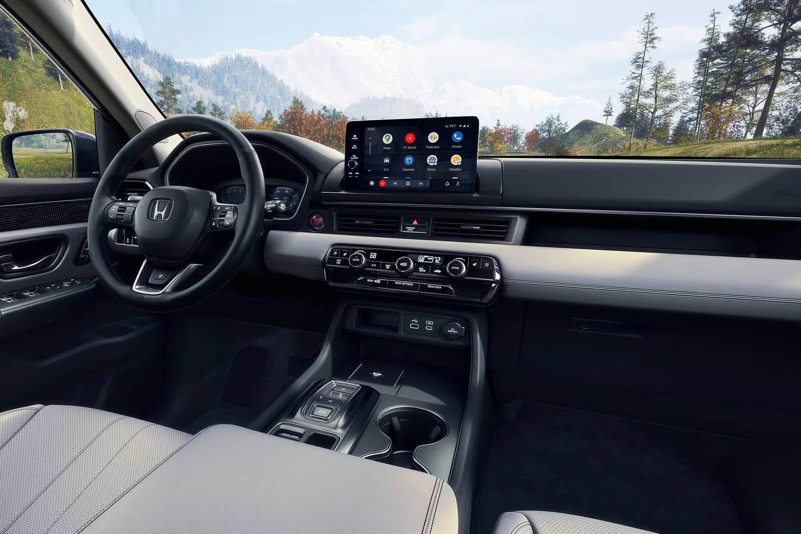 The front dash of a honda pilot.